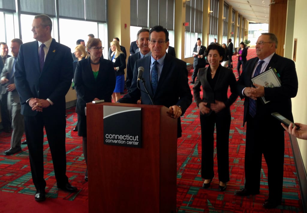 Connecticut Gov. Daniel Malloy addresses reporters at energy summit of New England governors in Hartford. Behind him, from left to right, Gov. Charlie Baker of Massachusetts; Meredith Hatfield, director of New Hampshire Office of Energy and Planning; Gov. Peter Shumlin of Vermont; Gov. Gina Raimondo of Rhode Island; and Gov. Paul LePage of Maine.