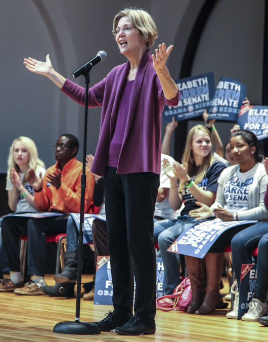 On No Child law, Warren carries Kennedy torch