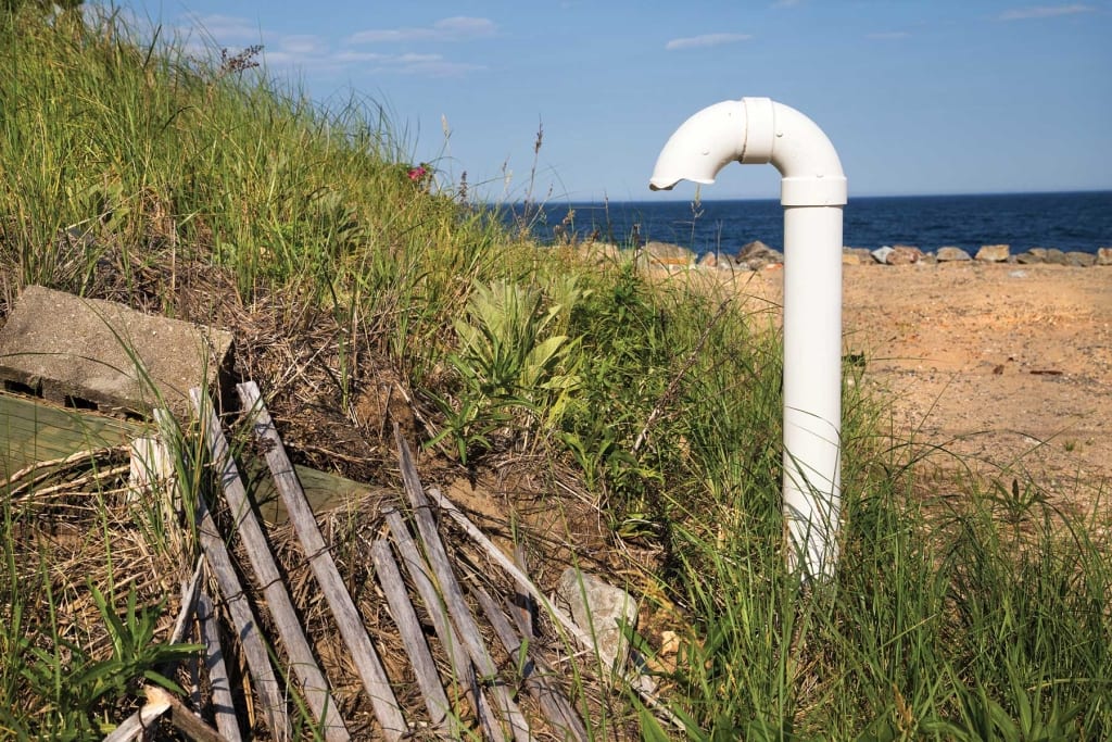 Sewer system components like this "candy cane" air vent played a role in sewer failure on Newburyport side of Plum Island.