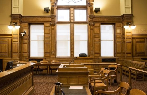 Defendant demands in-person, not virtual, day in court