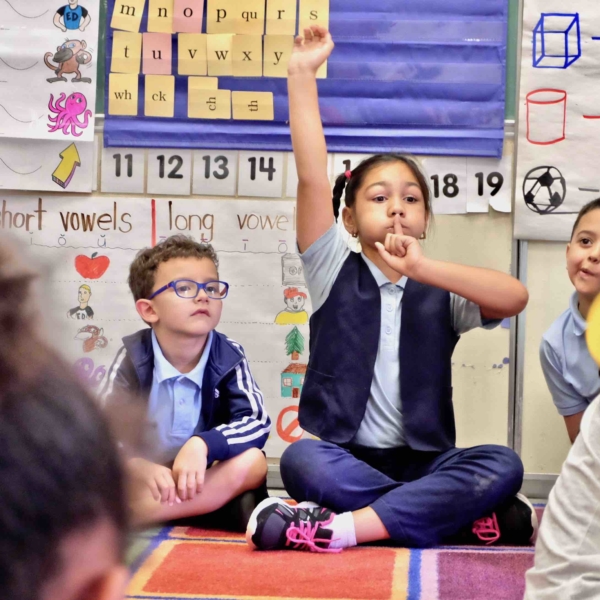 Dalializ, a kindergartener at the Kelly School in Holyoke, asks a question to an Enchanted Circle teaching artist. school education holyoke, photo by sarah betancourt