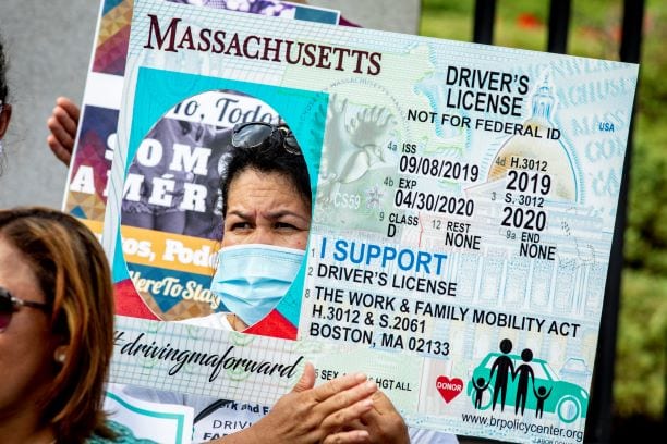 Immigrants rally in front of the Massachusetts State House in favor of the Work and Family Mobility Act. (Photo by Rose Lincoln)