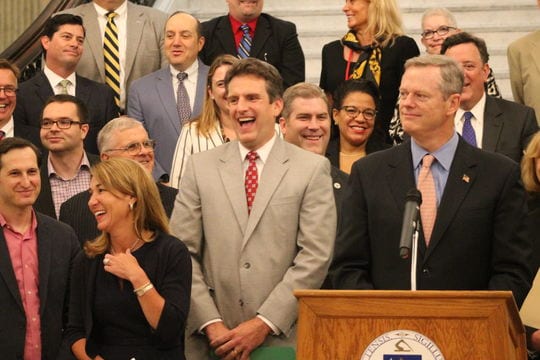 Jay Ash, center, with Lt. Gov. Karyn Polito and Gov. Charlie Baker at the signing of economic development legislation.