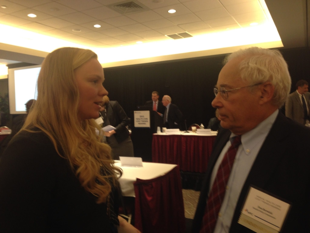 Lauren Taylor chats with Health Policy Commission member Don Berwick following her presentation.
