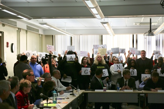 Activists interrupt criminal justice meeting