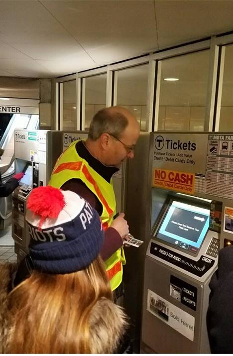 MBTA General Counsel John Englander was part of the "all hands on deck" operation the day of the New England Patriots Super Bowl parade, assisting customers with their tickets.