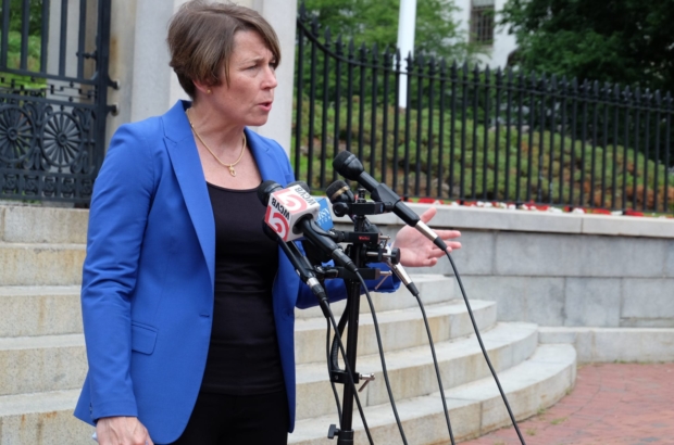 Attorney General Maura Healey answers questions about her lawsuit that challenges a Trump administration policy that would kick international students out of the country for taking online-only courses at their universities. (Photo by Sarah Betancourt)